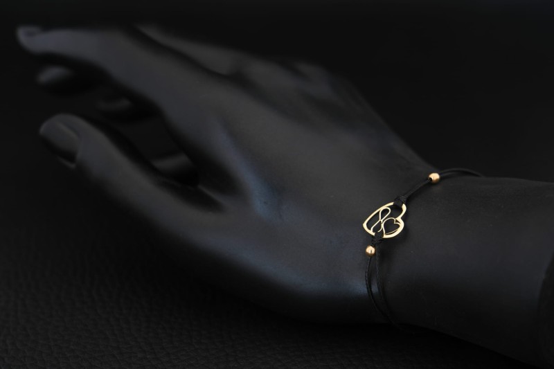 Delikatna bransoletka ze złotym sercem i nieskończonością – idealna na prezent.jpg