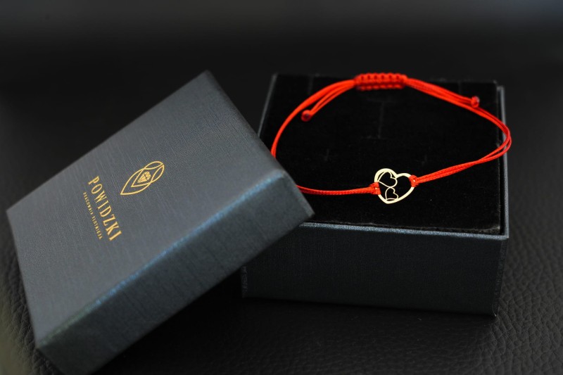 Złota bransoletka sznurkowa 2 serca.jpg