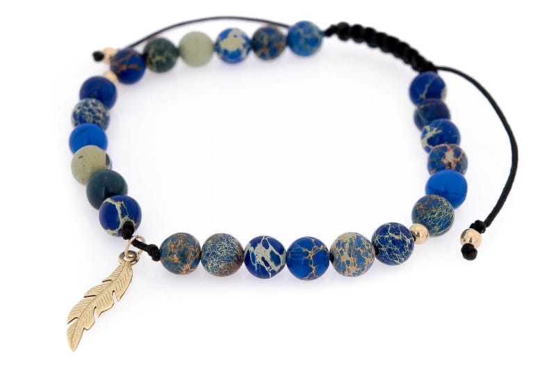 biżuteria z naturalnych kamieni pióro ze złota.jpg