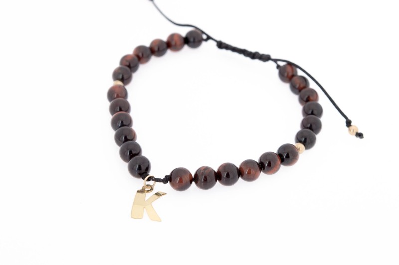 złota literka K na bransoletce.jpg