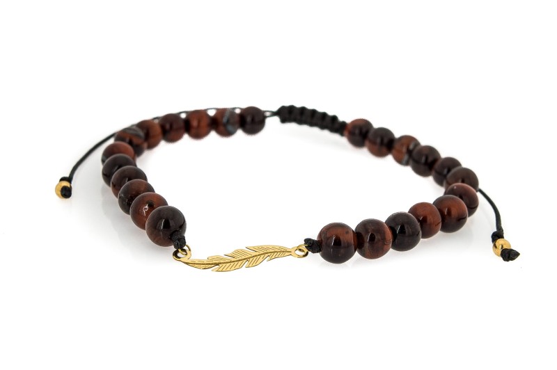 złote piórko jako ozdoba w bransoletce.jpg